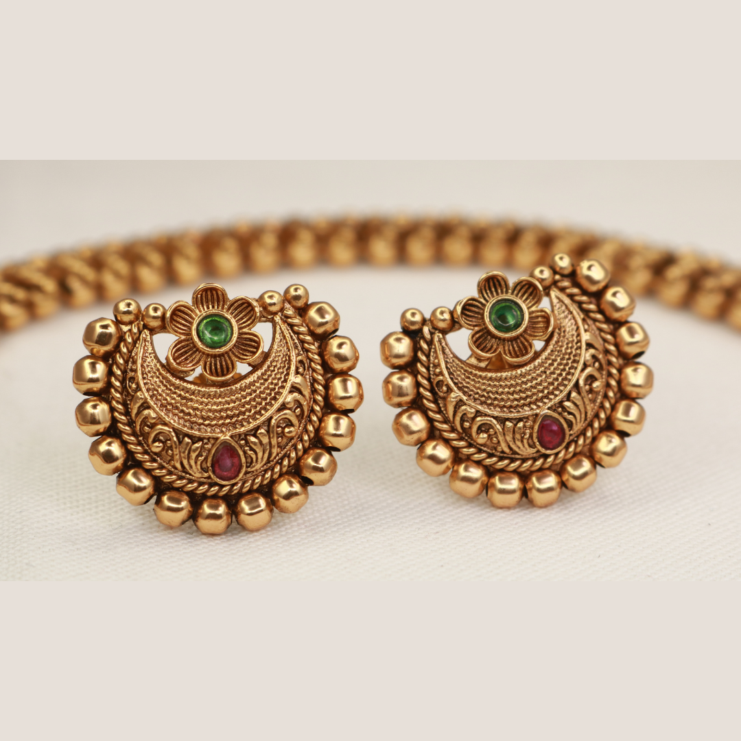 Chandbali choker necklace set displayed open showing necklace body and matching stud earrings