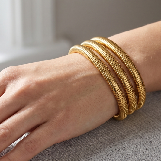 Adjustable gold plated stainless steel wrap bracelet styled for daily wear