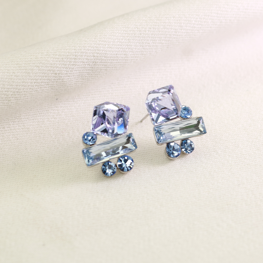 Lightweight silver-tone geometric crystal stud earrings handcrafted in Satara, Maharashtra