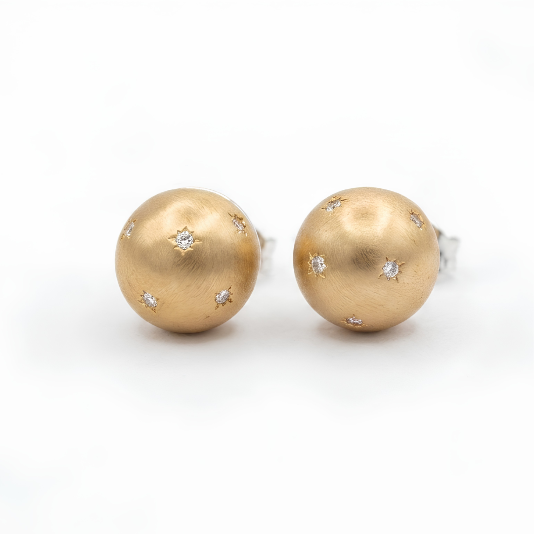 Gold dome CZ stud earrings side view showing silver posts and celestial star settings