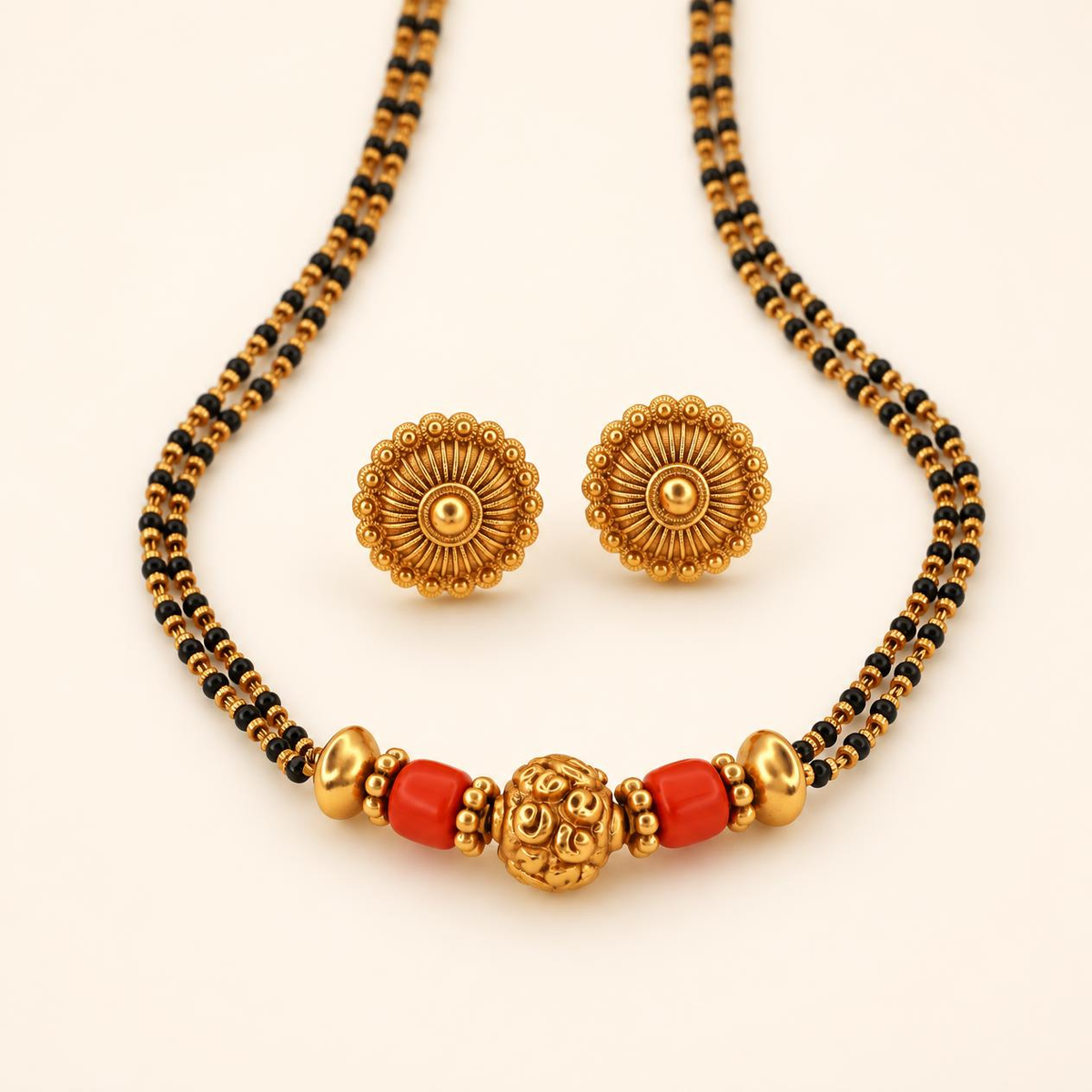 Coral gold mangalsutra triple strand black bead chain with carved gold pendant and matching antique gold sunflower stud earrings