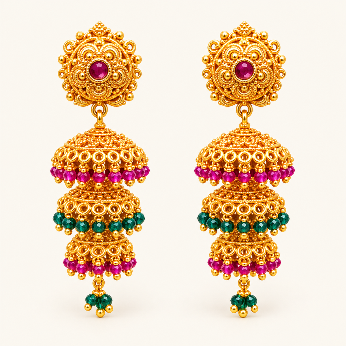 Gold-plated 3-layer jhumka earrings with ornate round tops and pink and green bead fringes – Jija Jewellery