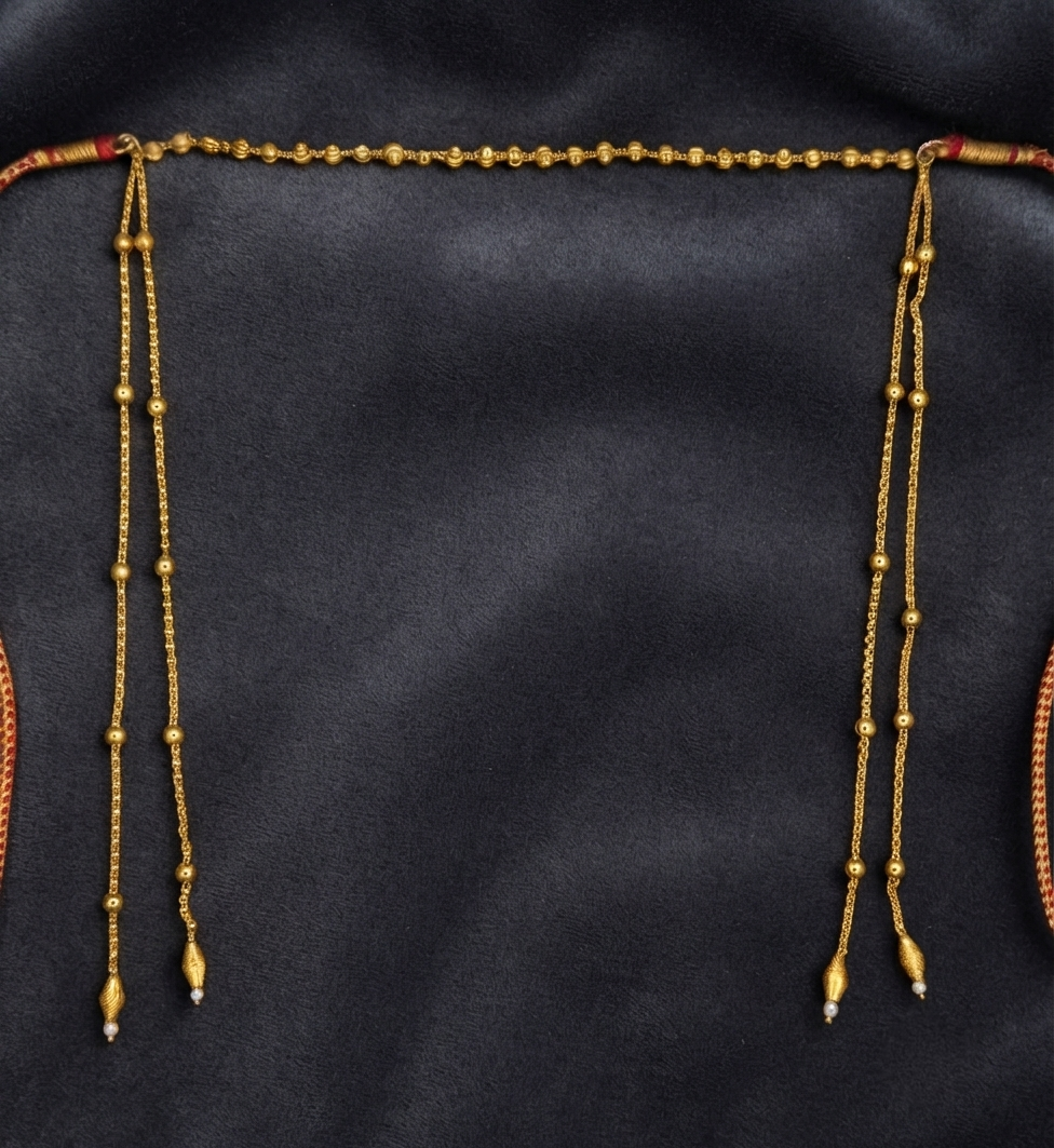 Gold plated bead chain mundavalya on dark velvet, traditional Maharashtrian bridal forehead jewellery