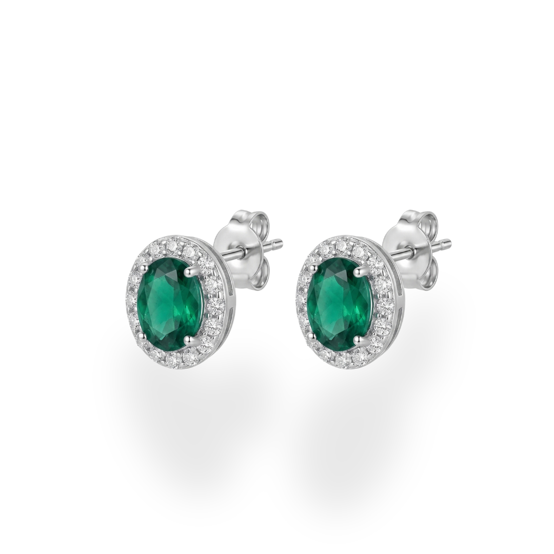 Matching emerald green halo CZ stud earrings styled for weddings and festive wear