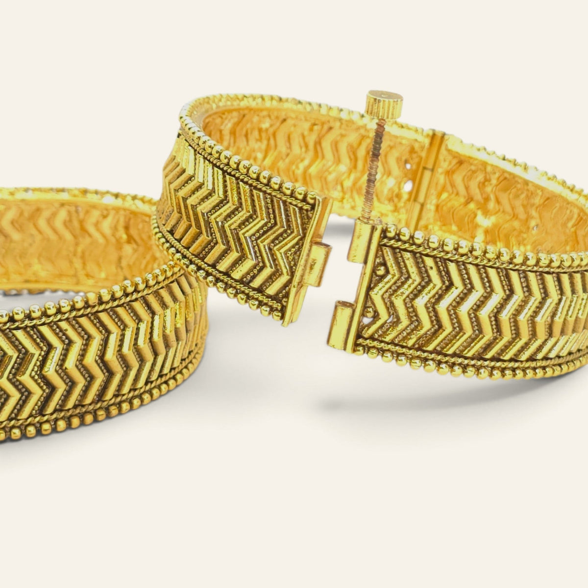Screw-openable antique gold plated chevron bangles by Jija Jewellery