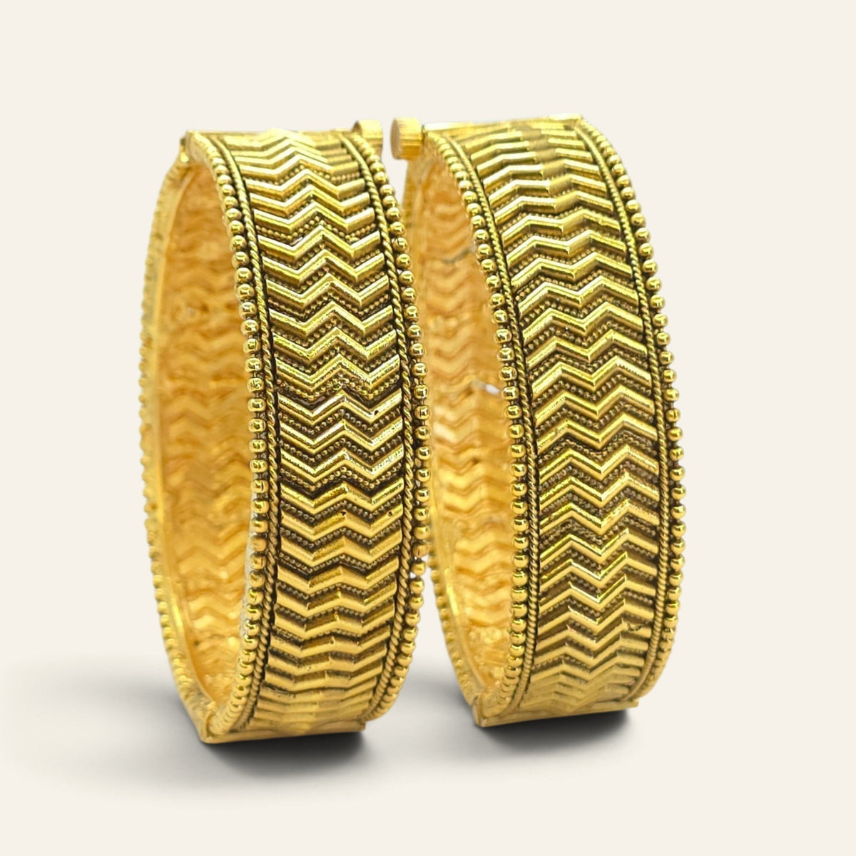 Antique gold plated chevron bangles set of 2 with beaded borders