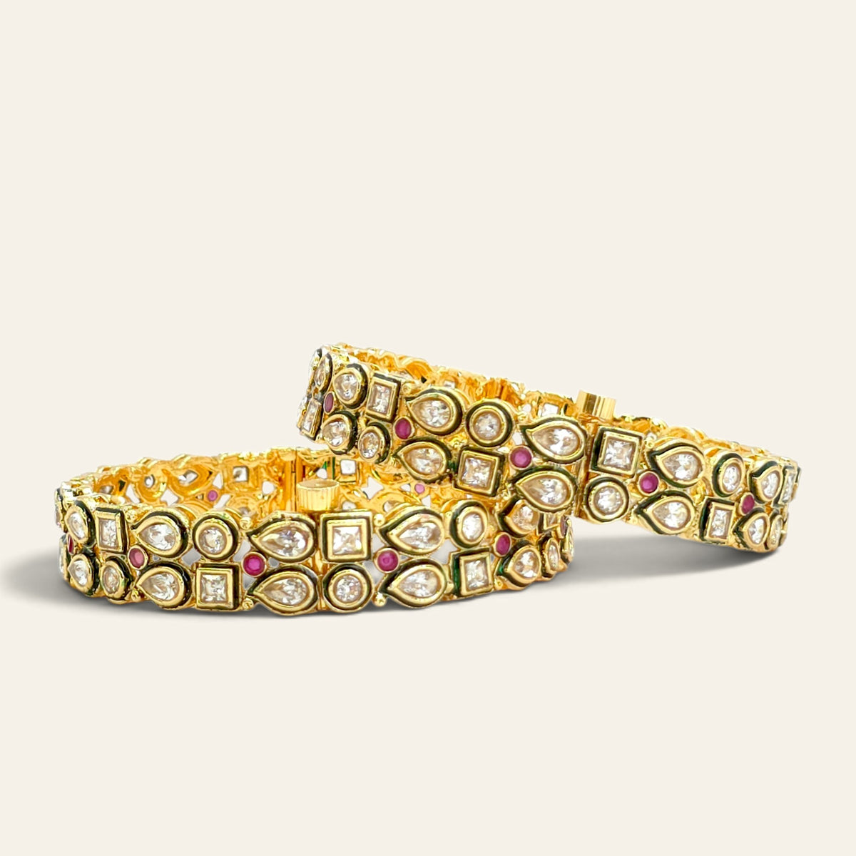 Kundan ruby meenakari bangles standing upright, side view