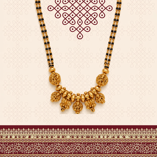 Lakshmi temple gold mangalsutra double strand black bead chain with hand-carved deity motif antique gold beads