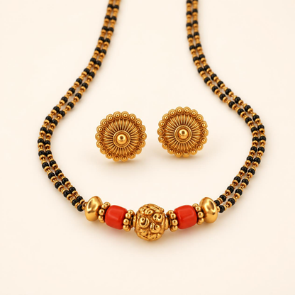 Coral gold mangalsutra triple strand black bead chain with carved gold pendant and matching antique gold sunflower stud earrings