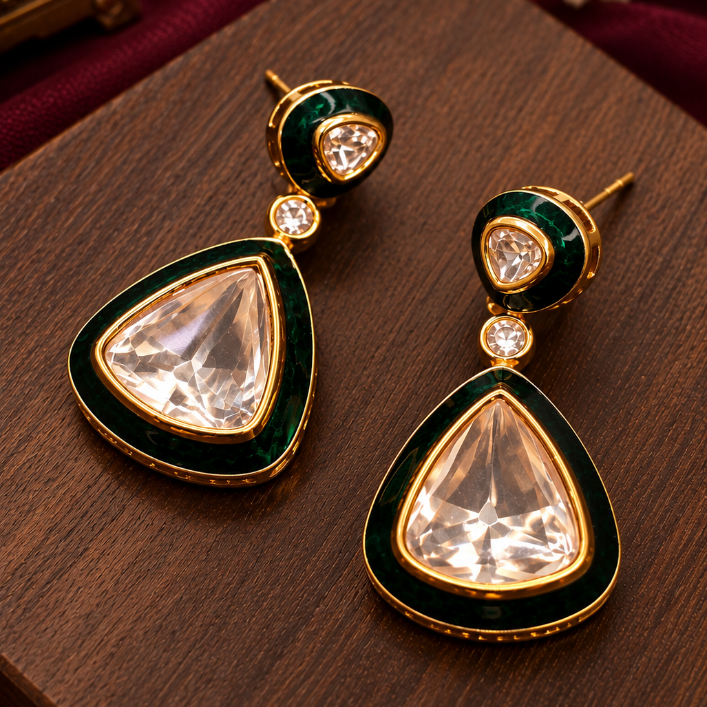 Matching emerald meena and gold Kundan drop earrings from the necklace set