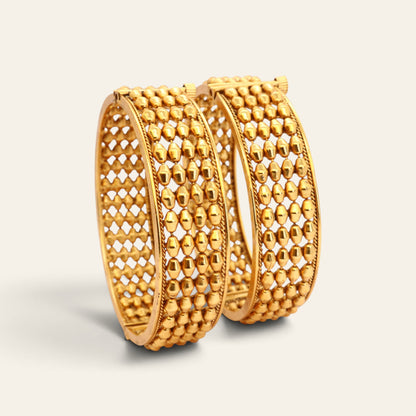 Pair of wide gold-tone openwork bangles with bead-like rows