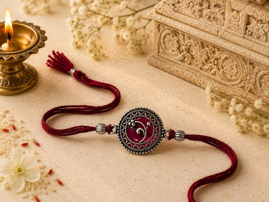 Classic oxidised rakhi for gifting in skin-friendly nickel-free metal with antique finish and adjustable thread, handmade by Jija Jewels in Satara