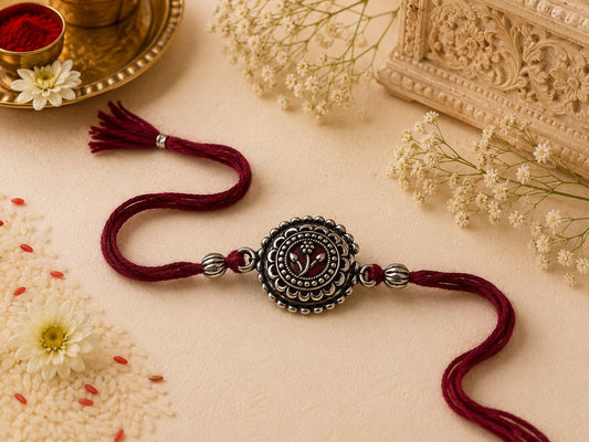 Traditional oxidised rakhi in skin-friendly nickel-free metal with antique finish and adjustable thread, handmade by Jija Jewels in Satara