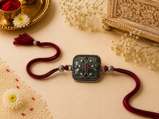 Handmade oxidised designer rakhi with antique finish in skin-friendly nickel-free metal, adjustable thread, handcrafted by Jija Jewels in Satara