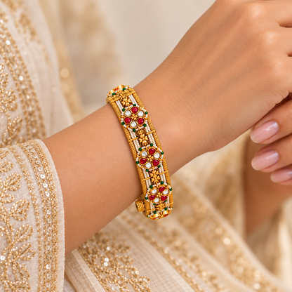 Ruby kundan polki bangle worn on wrist – bridal and festive gold plated kada