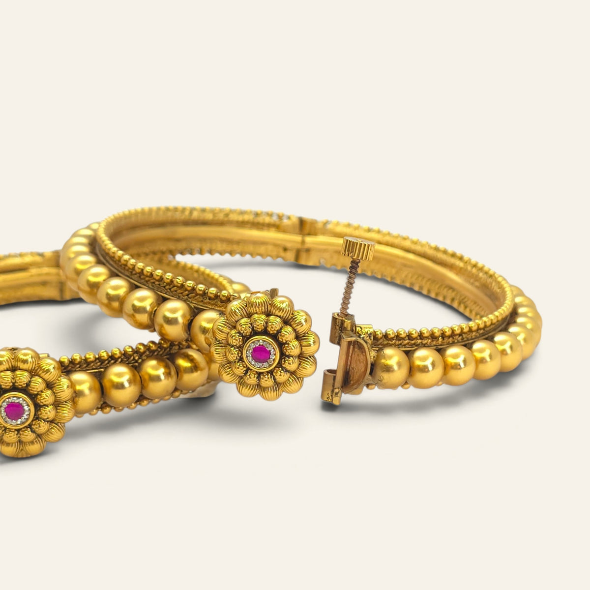 Pair of traditional Maharashtrian gold-plated bangles for saree and ethnic wear