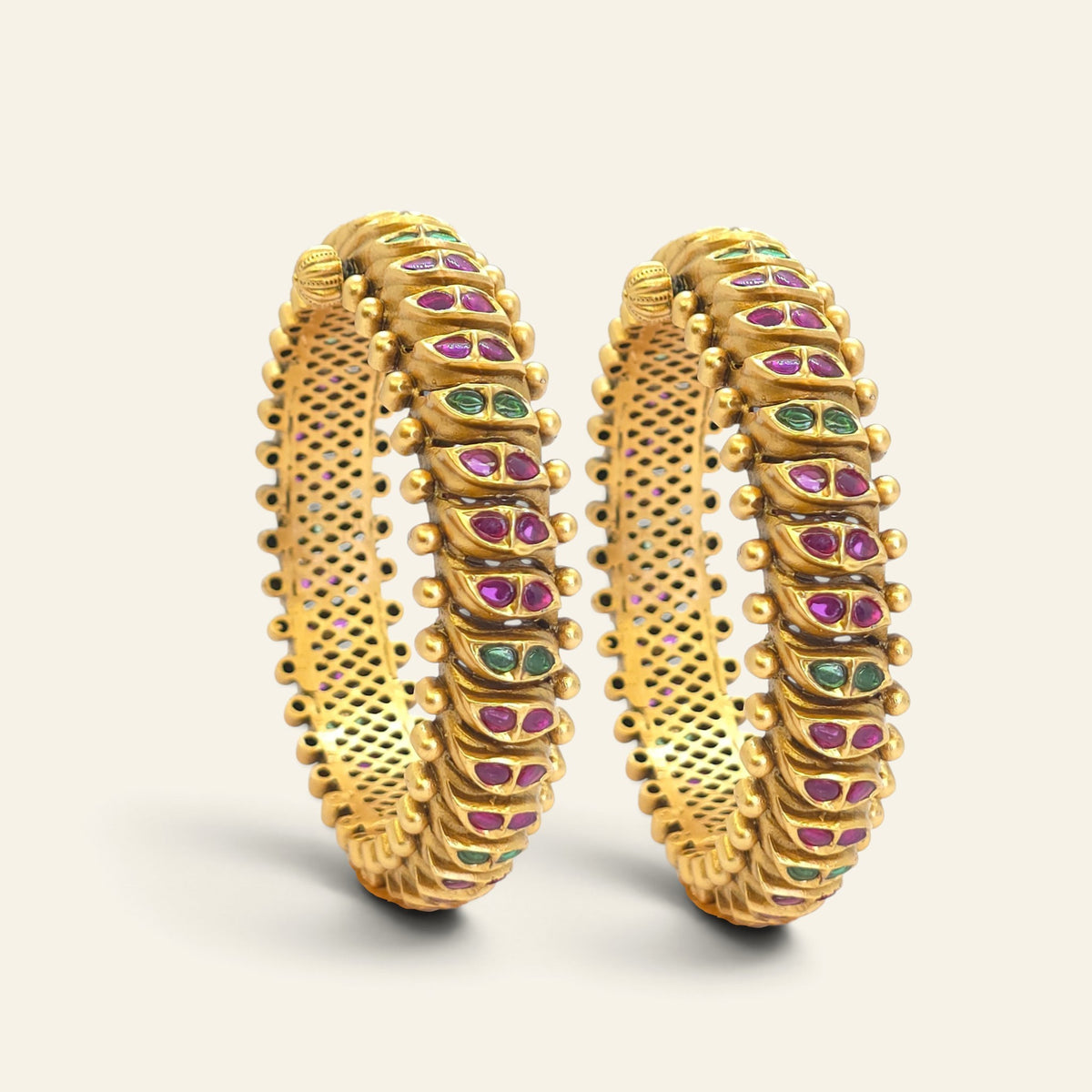 Set of 2 antique gold look kada bangles with red and green semi-precious stones
