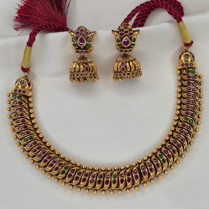 Shinde Shahi Kemp Choker antique gold necklace set with Jhumka earrings, ruby and emerald stones