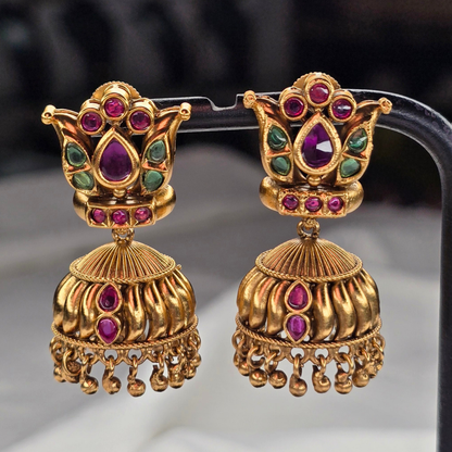 Shinde Shahi Jhumka Earrings with lotus design on white background