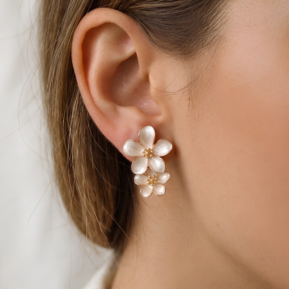 Double flower enamel stud earrings in cream with gold-tone stamen detail