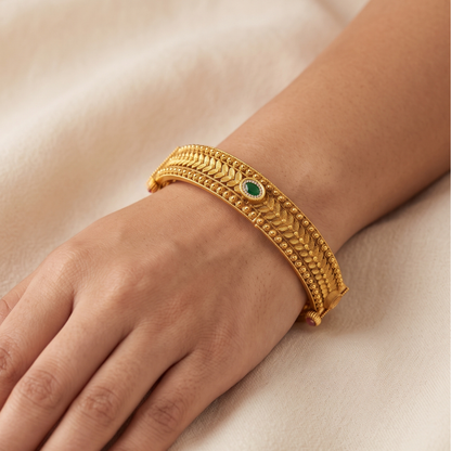 Antique gold plated kada bangles with ruby and emerald stones