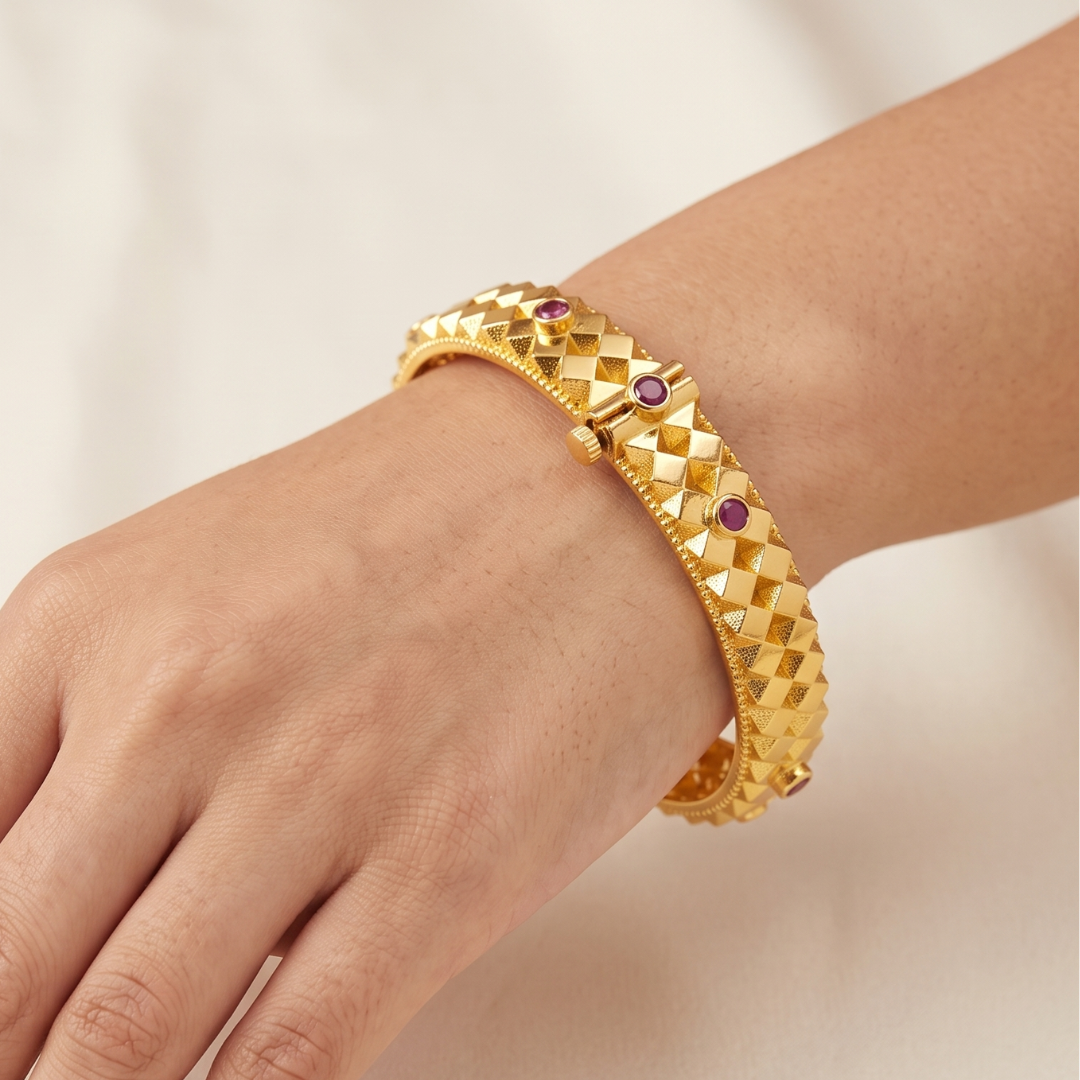 Ashtapailu glossy polish gold plated bangles with ruby stones