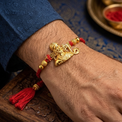 Gold-Plated 3D Shivaji Maharaj Rakhi — side view showing gold beads and red mauli thread
