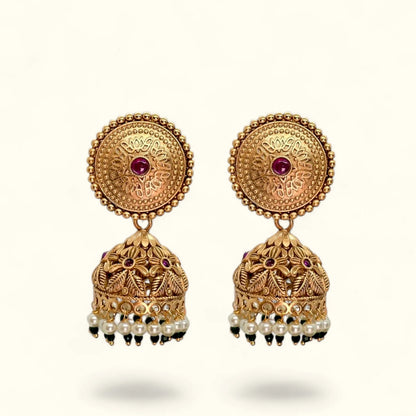 Gold plated jhumka earrings for women with floral round top, red stone and pearl drops – front view