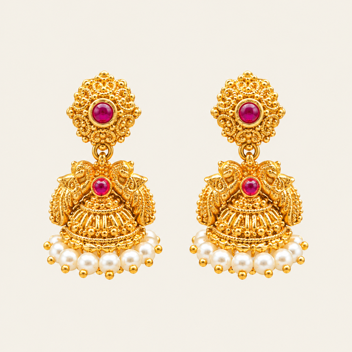 Gold-plated peacock pearl jhumka earrings with magenta stones and white pearl fringe – Jija Jewellery