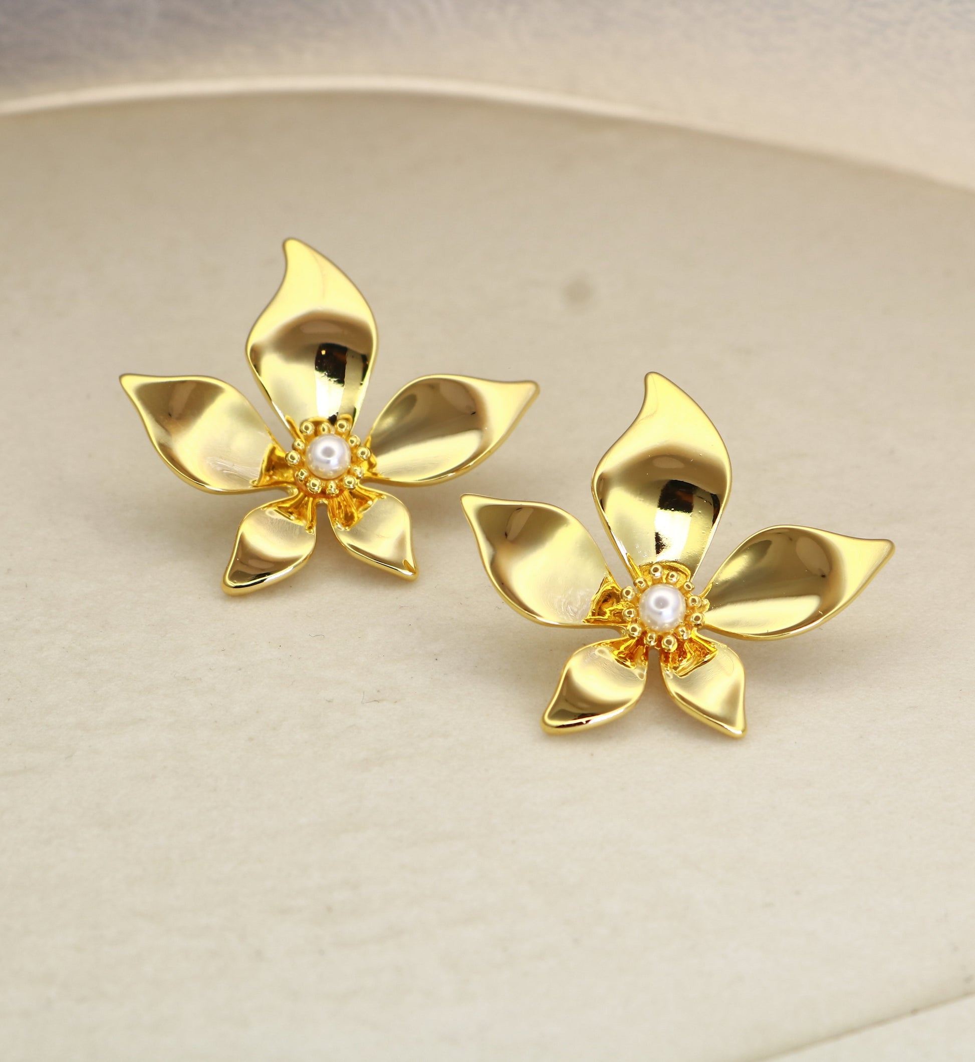 Golden Blossom floral stud earrings styled for ethnic and festive wear — Jija Jewellery Satara Maharashtra