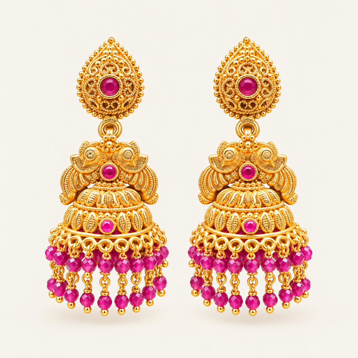 Magenta peacock jhumka earrings with gold-tone filigree, bell drops and layered magenta bead fringes – Jija Jewellery