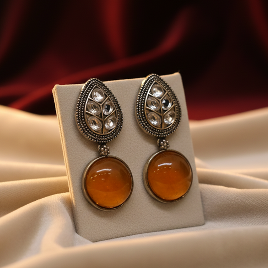 Oxidised German silver drop earrings with multicolour gemstones by Jija Jewellery – front view