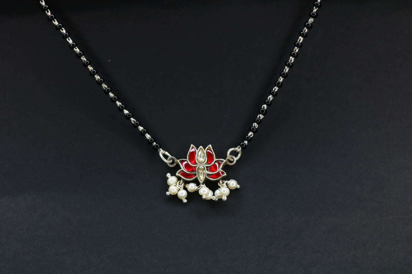 Handcrafted silver lotus Kundan mangalsutra worn — lifestyle shot by Jija Jewels