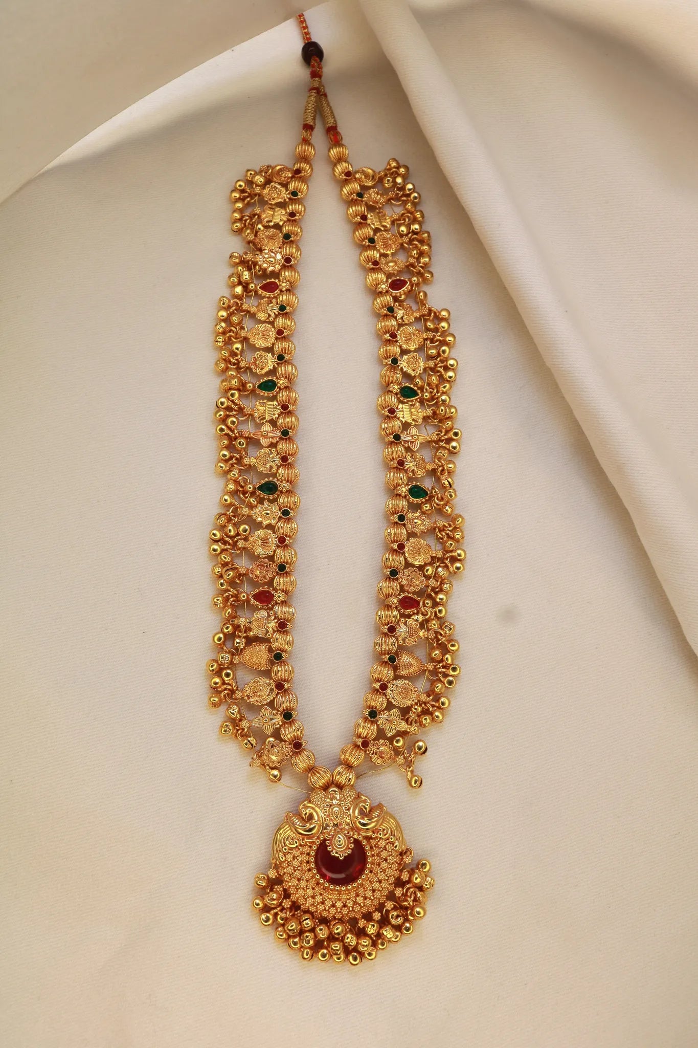 Gold plated Kolhapuri Saaj necklace with intricate Maharashtrian design.