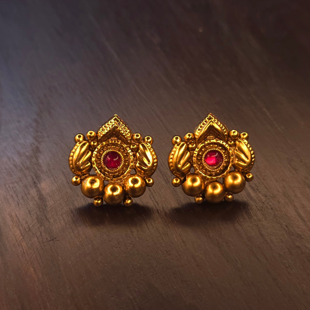 Maharashtrian Thushi choker necklace with ruby-red stone and matching lotus stud earrings, antique gold plated