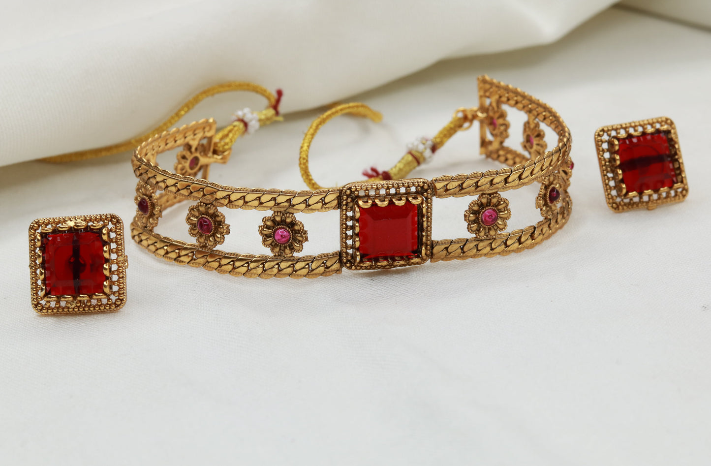 Manik Choker Necklace Set Close-Up – Bold Red Square Stone in Antique Gold Bezel with Floral Chain | Jija Jewellery