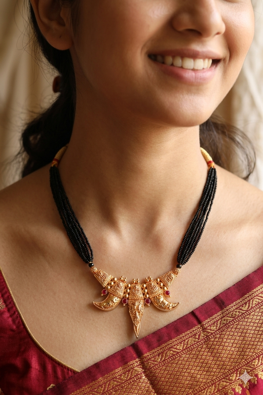 Maharashtrian woman wearing Kirtimukh Mangalsutra with Paithani silk saree – Jija Jewellery Satara