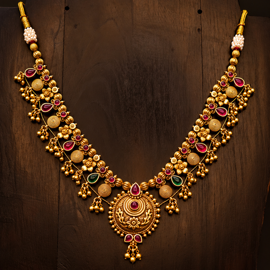 Saaj traditional gold plated necklace with dangling gold-tone beads, close-up