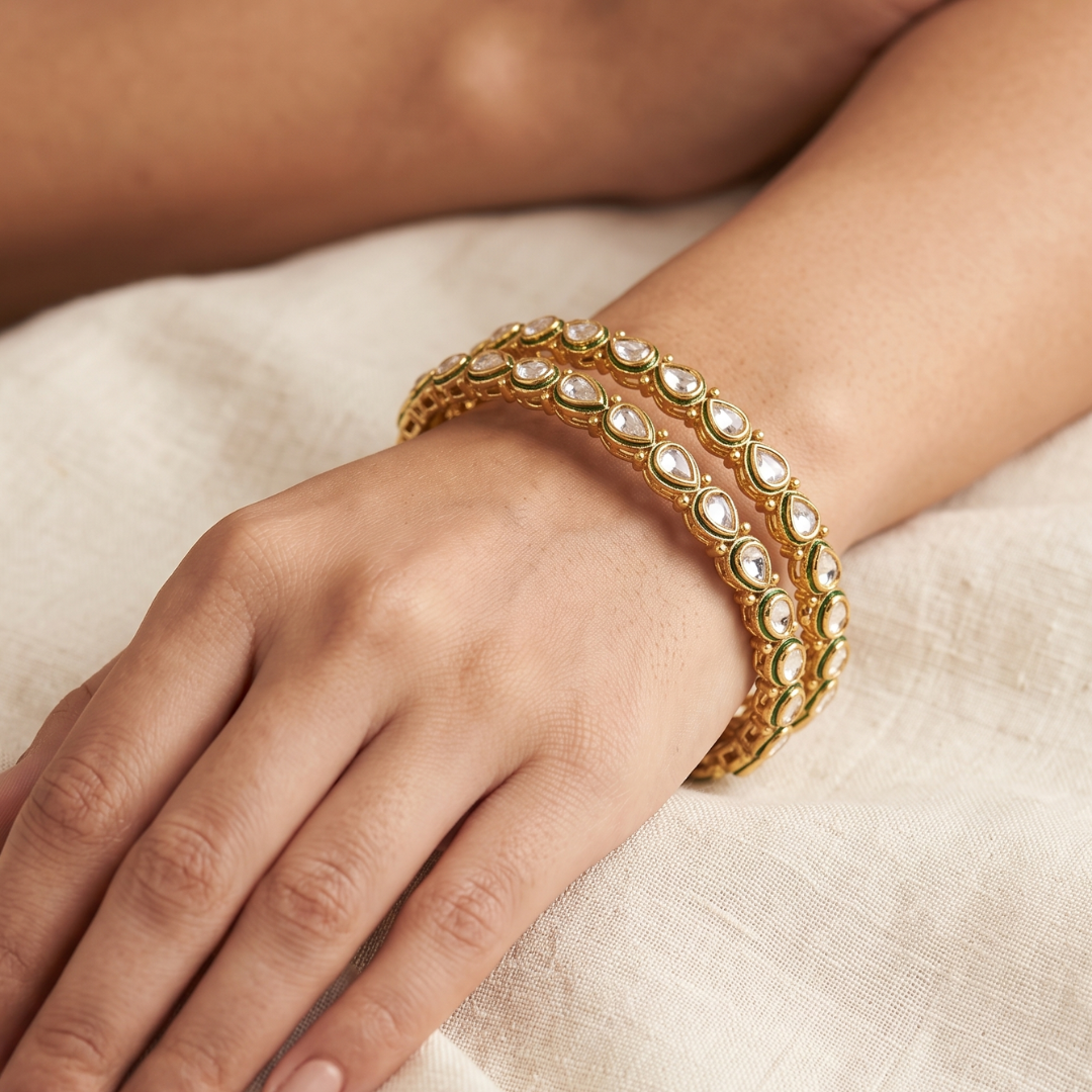 White Kundan pear drop gold plated bangles