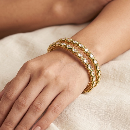 White Kundan pear drop gold plated bangles